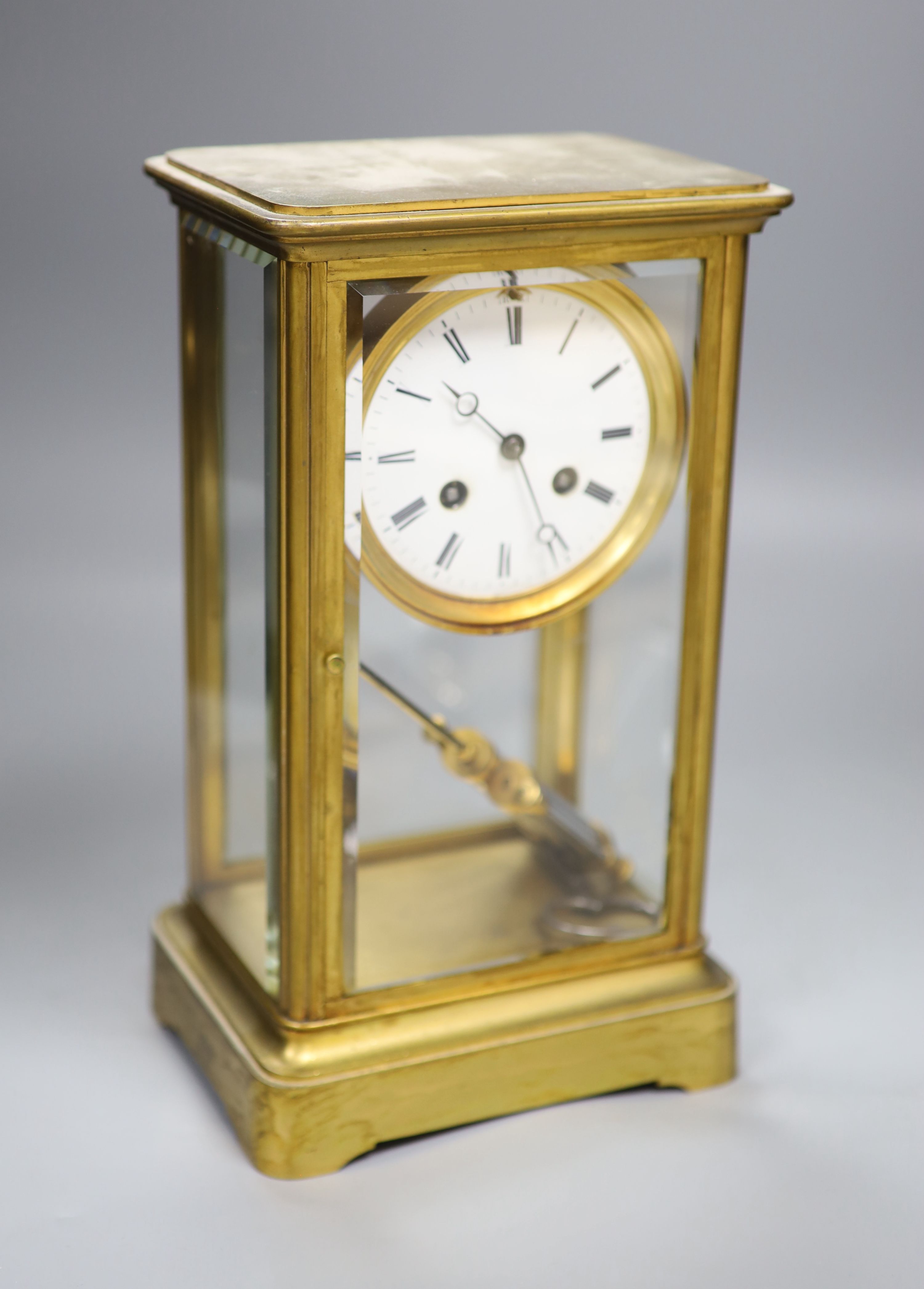 A 19th century French four-glass mantel clock, bell-striking movement with countwheel, mercury pendulum, with key, 30cm high